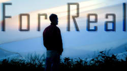 man looking into the distance, seen from the back