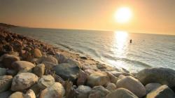 beach and rocks at daybreak