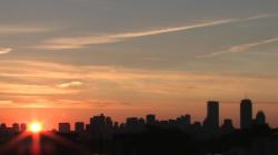 sunrise over a city